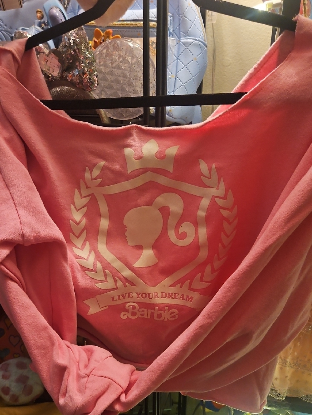 Barbie Pink Off The Shoulder Sweatshirt with White Crest Graphic